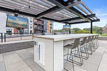 The gallery, indoor/outdoor entertainment suite with rooftop grill